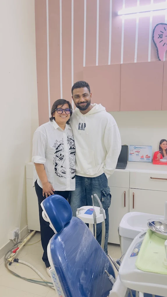 Dentist posing with a visitor inside the clinic at Your Dentist, Malviya Nagar, Jaipur