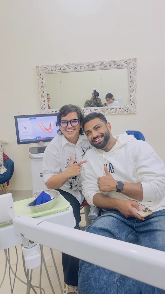 Dentist and patient smiling together in the clinic at Your Dentist, Malviya Nagar, Jaipur