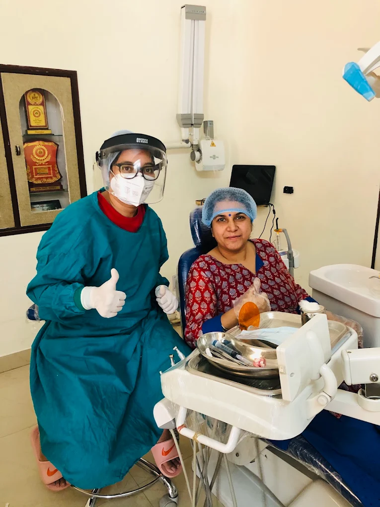 Dentist and patient giving a thumbs-up in the treatment room at Your Dentist, Malviya Nagar, Jaipur