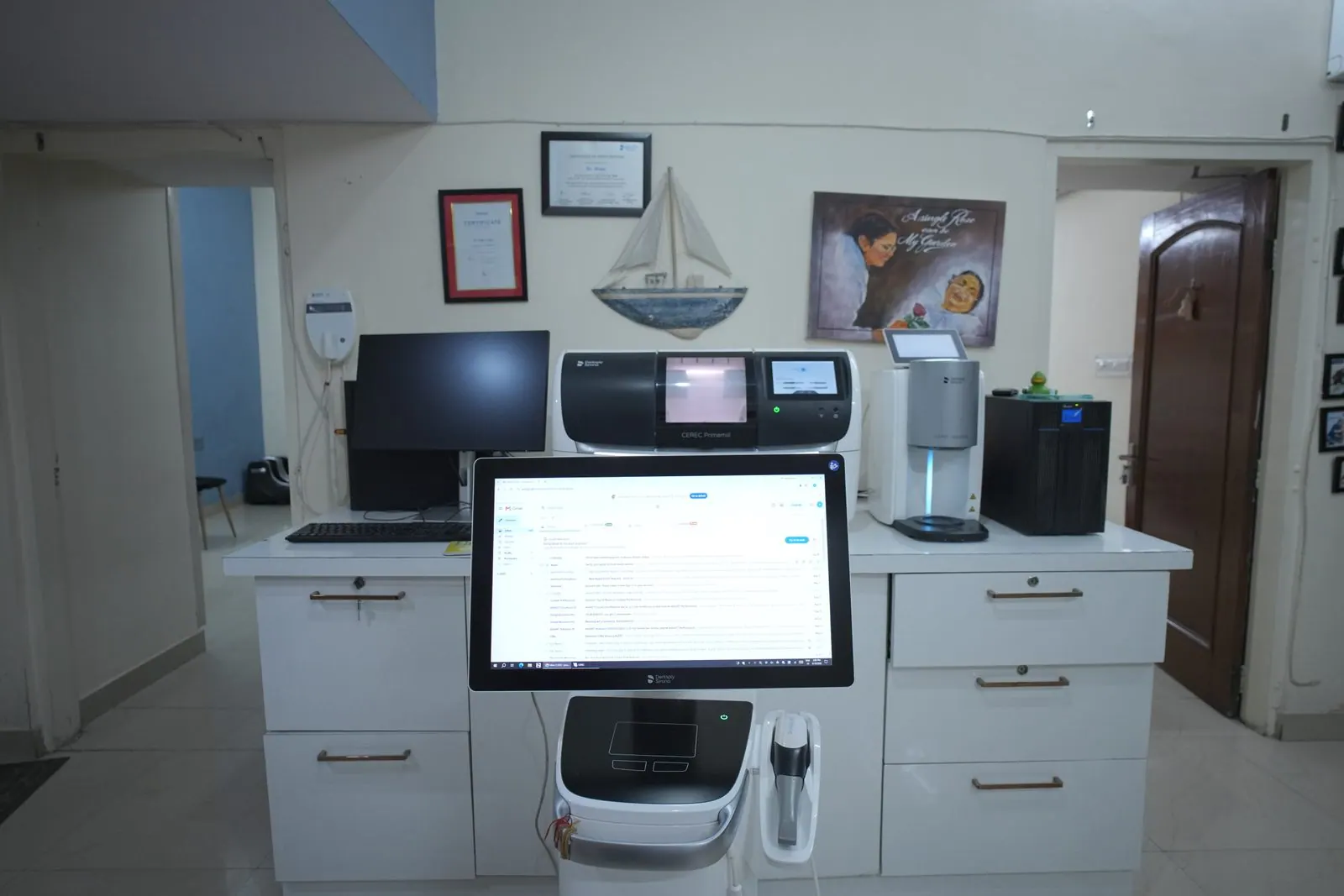 Digital workstation and scanner on the clinic counter at Your Dentist, Malviya Nagar, Jaipur