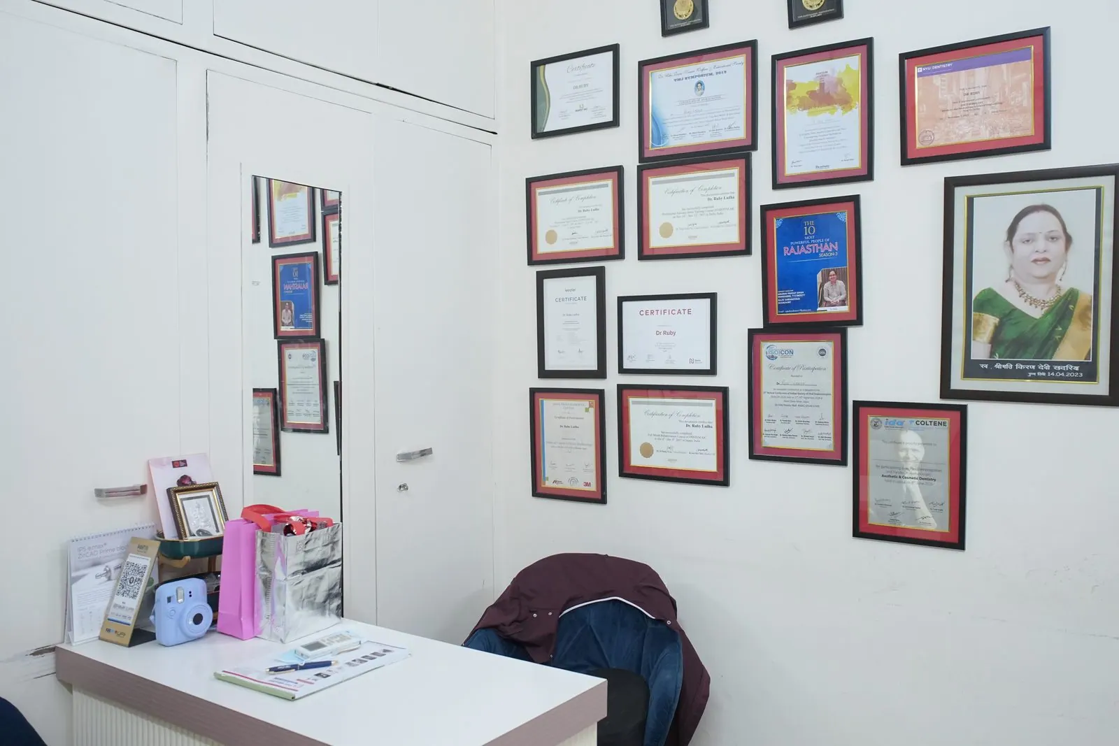 Reception area with framed certificates at Your Dentist, Malviya Nagar, Jaipur